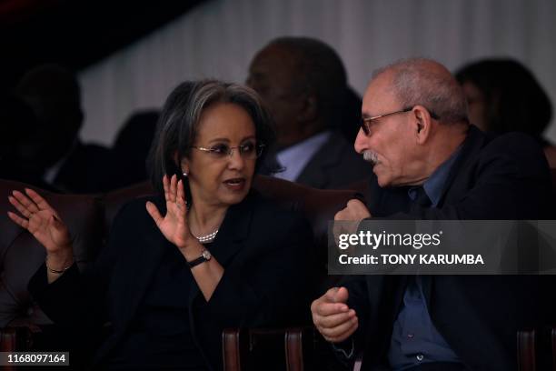 Ethiopia's President Sahle-Work Zewde chats with her Sahrawi counterpart, Brahim Ghali on September 14, 2019 on September 14 during the farewell...