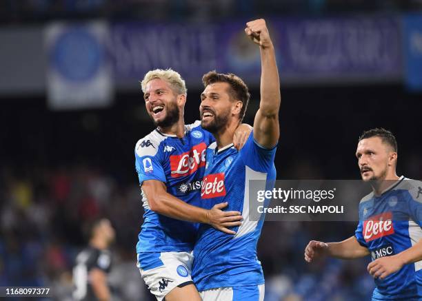 Dries Mertens of Napoli celebrates after scoring the the second goal of his team with teammate Fernando Llorente during the Serie A match between SSC...