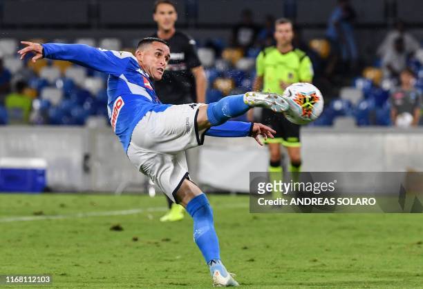 Napoli's Spanish forward Jose Callejon shoots on goal during the Italian Serie A football match Napoli vs Sampdoria on September 14, 2019 at the San...