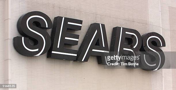 Sears logo is visible on a store October 24, 2001 in Niles, IL. Sears, Roebuck and Co. Said Wednesday, October 24, 2001 that it is eliminating 4,900...