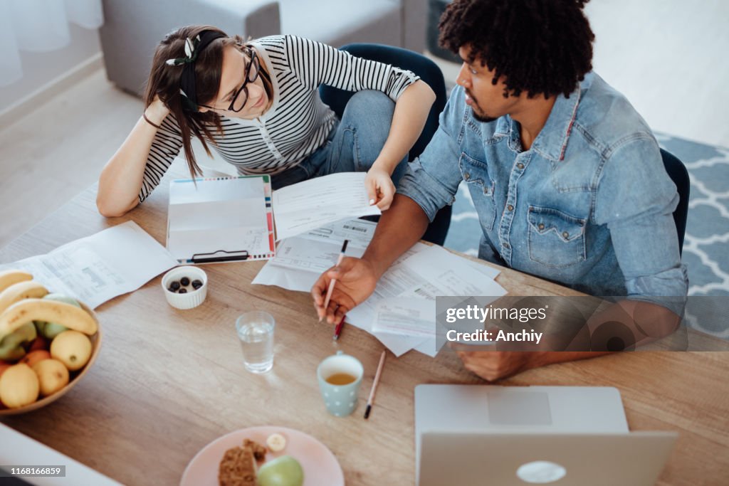 Couple discussing home economics