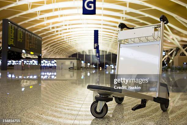 terminal - luggage trolley stock pictures, royalty-free photos & images