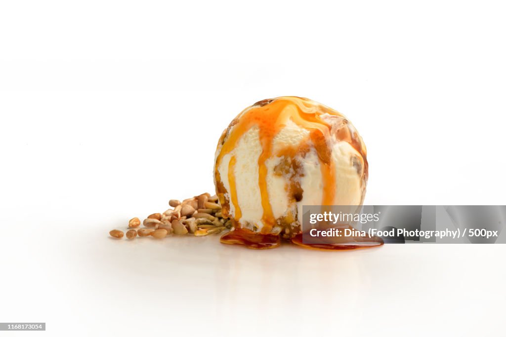 https://media.gettyimages.com/id/1168173054/photo/ice-cream-ball-sunflower-seeds-and-caramel-and-pine-nuts-flavor-with-ingredients-isolated-on-a.jpg?s=1024x1024&w=gi&k=20&c=vUZusGfJIVFVU0vyN-7xWuSgN9WomxNTW31BoAkVXQQ=