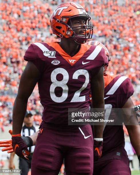 Tight end James Mitchell of the Virginia Tech Hokies celebrates his touchdown reception against the Furman Paladins in the second half at Lane...