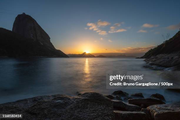 sunrise at red beach - praia vermelha rio de janeiro stock pictures, royalty-free photos & images
