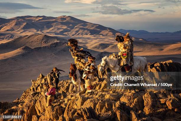 mongolian eagle hunters - kazakhstan man stock pictures, royalty-free photos & images