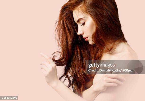 double exposure of redhead woman and beige background - mumbai nusi foto e immagini stock