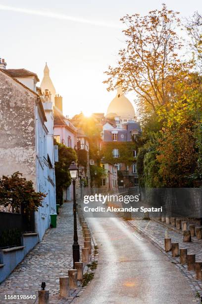 sunrise in montmartre, paris, france - church color light paris stockfoto's en -beelden