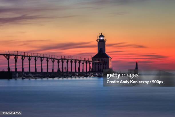 michigan city east pierhead lighthouse after sunset - michigan city indiana stock pictures, royalty-free photos & images