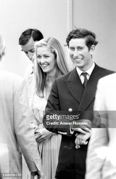 Prince Charles, the Prince of Wales and Lady Penelope Romsey arrive at the Guards Polo Club on June 01, 1975 in Windsor, England.