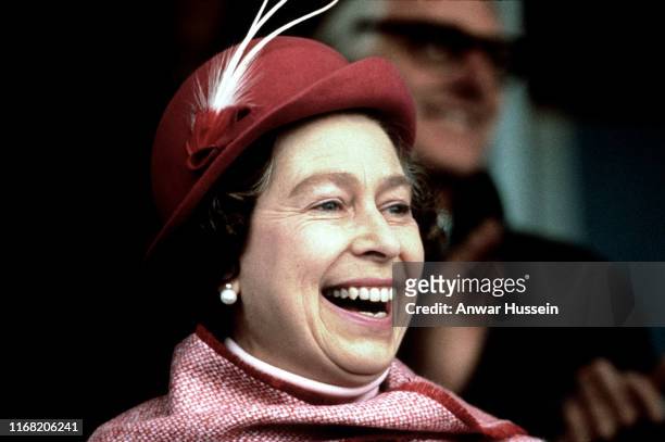 Queen Elizabeth ll laughs as she attends the Windsor Horse Show on May 01, 1969 in Windsor, England.