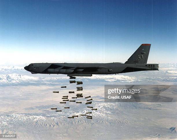 Airforce B-52 Stratofortress heavy bomber drops bombs in this undated file photo. The United States and Britain launched powerful air and missile...