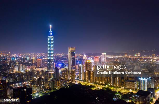 aerial view of 101 building at night. - taipei taiwan stock pictures, royalty-free photos & images