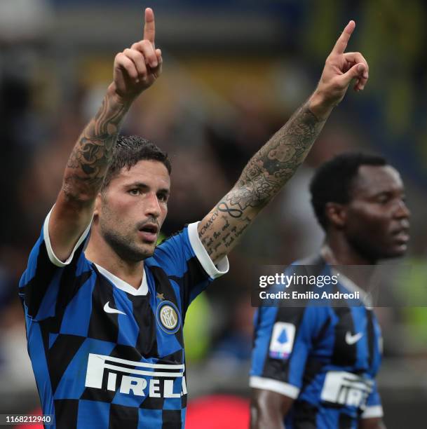 Stefano Sensi of FC Internazionale celebrates after scoring the opening goal during the Serie A match between FC Internazionale and Udinese Calcio at...