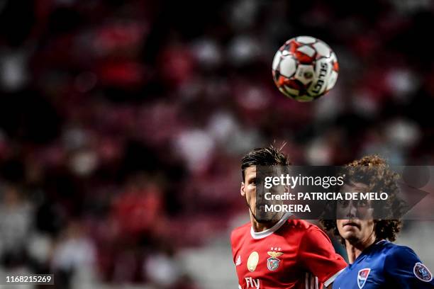 Benfica's Portuguese defender Ruben Dias vies with Gil Vicente's Bulgarian midfielder Bozhidar Kraev during the Portuguese League football match...