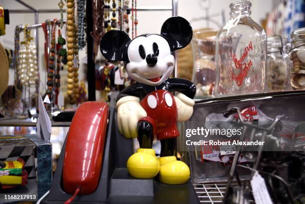 Vintage AT&T Mickey Mouse telelphone is among items for sale in an antiques shop in Grants Pass, Oregon.