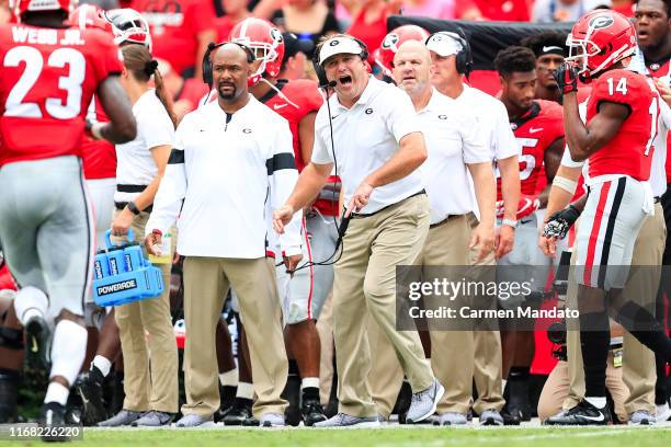 Head coach Kirby Smart of the Georgia Bulldogs yells to his players during the first half of a game against the Arkansas State Red Wolves at Sanford...