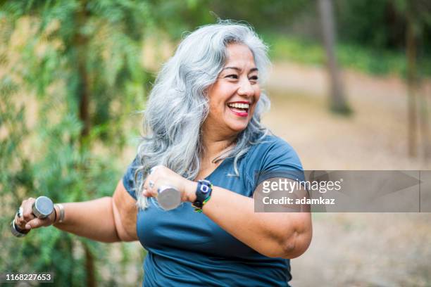 mature mexican woman working out - fat people stock pictures, royalty-free photos & images