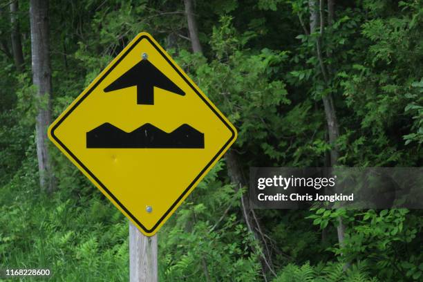 bumpy road ahead sign - bumpy stock pictures, royalty-free photos & images