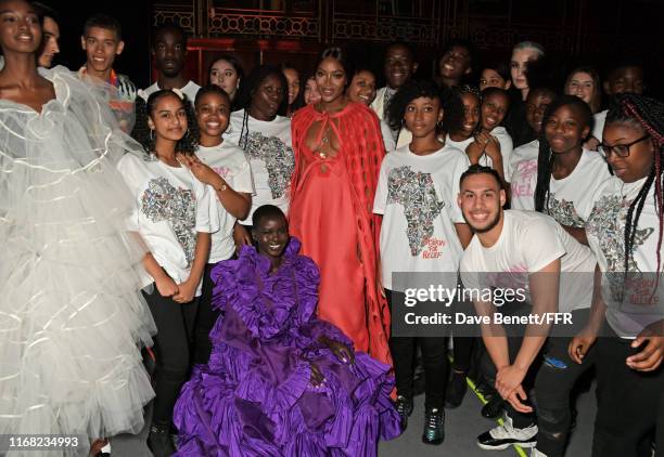 Adut Akech, Naomi Campbell and Erin O'Connor pose with guests backstage during Fashion For Relief London 2019 at The British Museum on September 14,...
