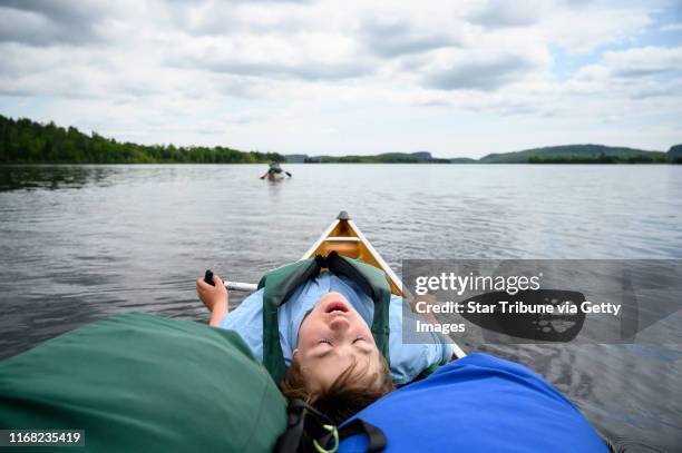 Aidan Jones was exhausted as he paddled North Fowl Lake into South Fowl Lake Friday. Tony Jones, his 14-year old son Aidan, their friend Brad Shannon...