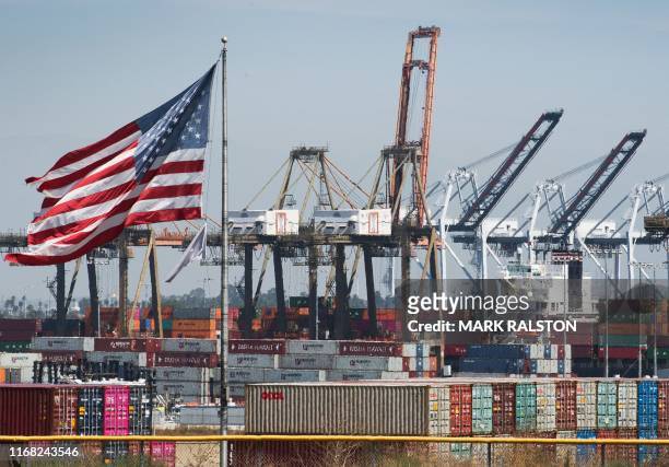 Shipping containers from China and other Asian countries are unloaded at the Port of Los Angeles as the trade war continues between China and the US,...