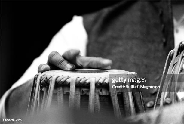 Ravi Shankar, Alla Rakha and Kamala Chakravarty, seated on a draped dias performed for hours on closing Sunday of The Monterey International Pop...