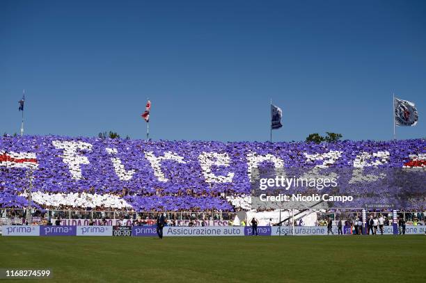 Fans of ACF Fiorentina show their support prior to the Serie A football match between ACF Fiorentina and Juventus FC. The match ended in a 0-0 tie.