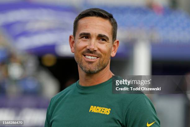 Head Coach Matt LaFleur of the Green Bay Packers stands on the field prior to a preseason game against the Baltimore Ravens at M&T Bank Stadium on...
