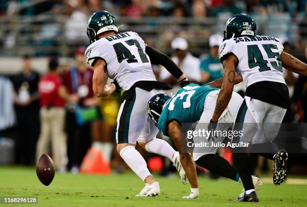 Daeshon Hall of the Philadelphia Eagles knocks the ball loose from Gardner Minshew of the Jacksonville Jaguars during the second quarter of a...