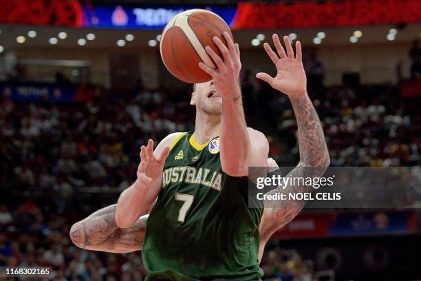 Australia's Joe Ingles goes to the basket during the Basketball World Cup third place game between France and Australia in Beijing on September 15,...