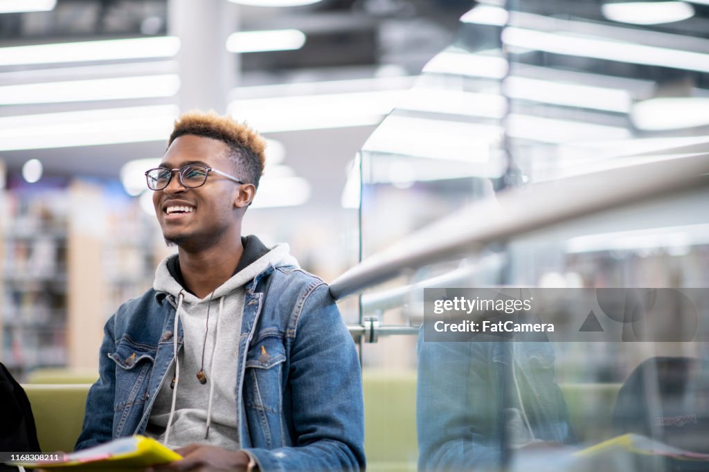 Smiling male student at school