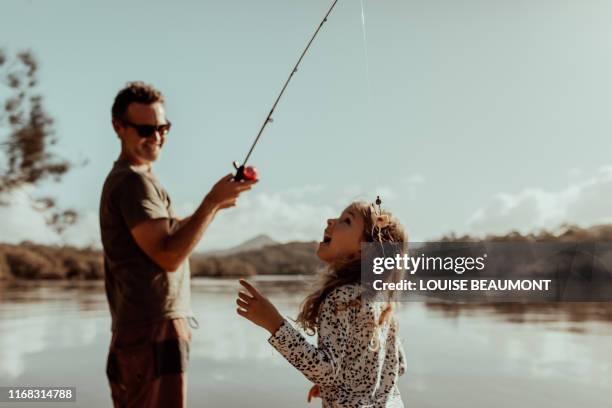 oh yuck dad, stinky prawn bait! - fishing australia stock pictures, royalty-free photos & images