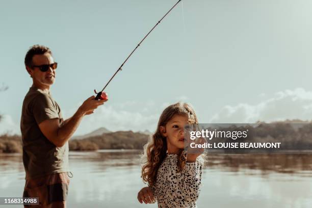 oh yuck dad, stinky prawn bait! - brunswick heads nsw stock pictures, royalty-free photos & images