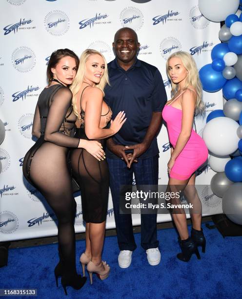 Tori Black, Victoria June, Lawrence Taylor and Alexis Monroe attend Sapphire Gentlemen's Club Debuts New Times Square Location on August 15, 2019 in...