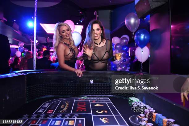 Tori Black and Alexis Monroe pose during Sapphire Gentlemen's Club Debuts New Times Square Location on August 15, 2019 in New York City.