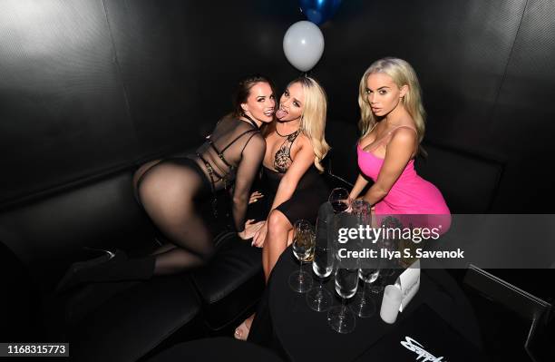 Tori Black, Alexis Monroe and Victoria June attend Sapphire Gentlemen's Club Debuts New Times Square Location on August 15, 2019 in New York City.