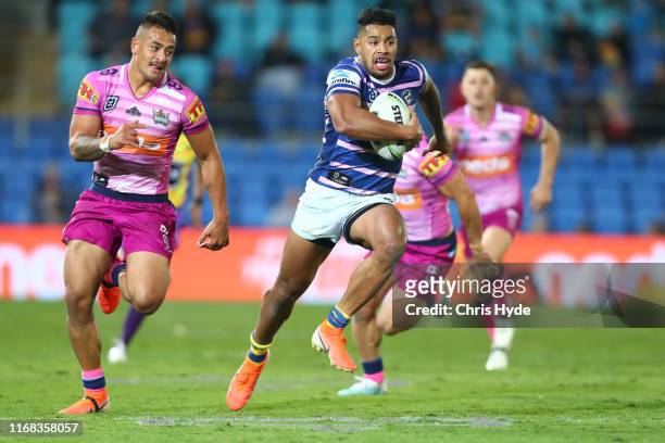 Waqa Blake of the Eels makes a break to score a try during the round 22 NRL match between the Gold Coast Titans and the Parramatta Eels at Cbus Super...