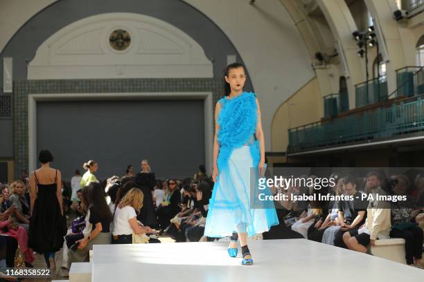 Models on the catwalk of Molly Goddard Spring/Summer 2020 London Fashion Week show at Seymour Hall, London.