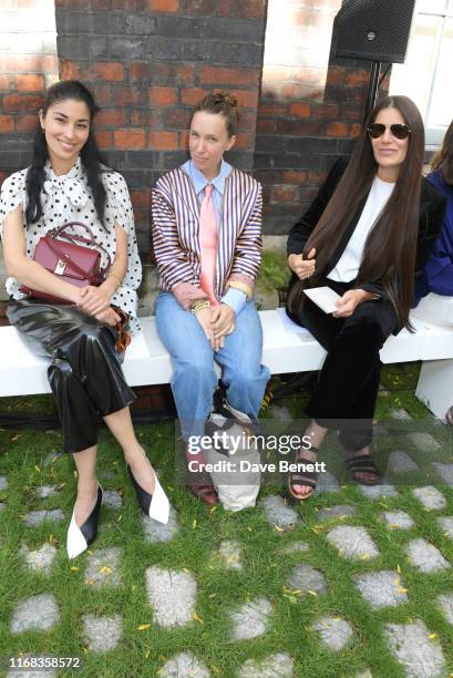 Caroline Issa, Lady Frances von Hofmannsthal and Elizabeth Saltzman attend the Roland Mouret front row during London Fashion Week September 2019 at...