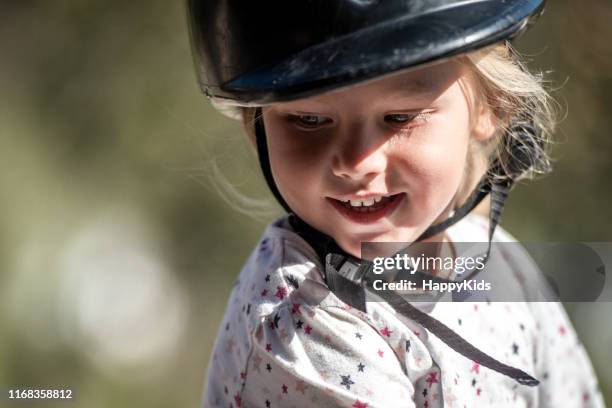 close-up of girl - riding hat stock pictures, royalty-free photos & images