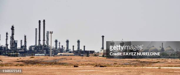 Picture taken on September 15, 2019 shows an Aramco oil facility near al-Khurj area, just outside the Saudi capital Riyadh. Saudi Arabia raced today...