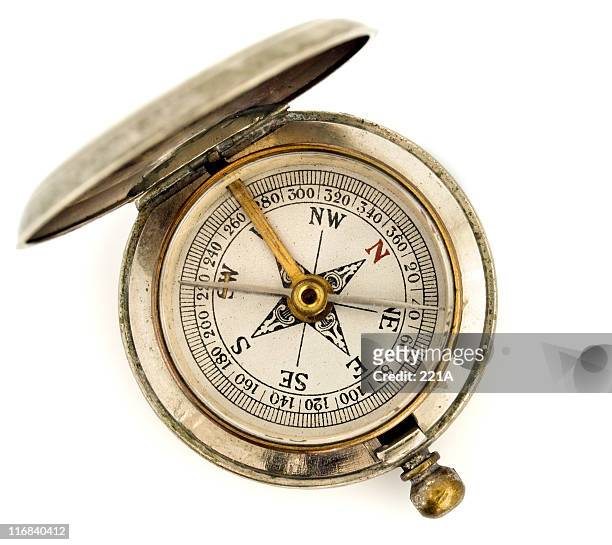 tasca antico compasso su bianco - compass north foto e immagini stock