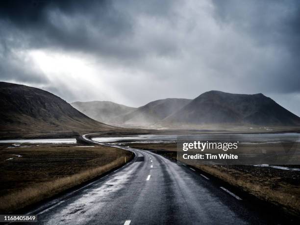 road trip through the dramatic landscape of westfjords iceland - westfjorde island stock-fotos und bilder