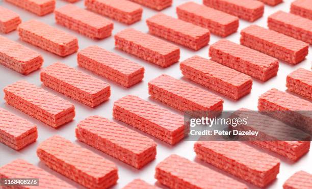 wafer biscuits on production line - wafer stock pictures, royalty-free photos & images