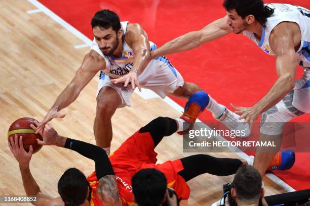 Argentina's Facundo Campazzo fights for the ball with Spain's Ricky Rubio during the Basketball World Cup final game between Argentina and Spain in...