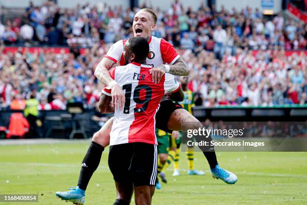 Leroy Fer of Feyenoord celebrates 3-0 with Rick Karsdorp of Feyenoord during the Dutch Eredivisie match between Feyenoord v ADO Den Haag at the...