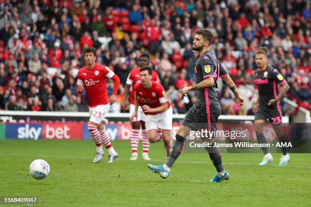 Mateusz Klich of Leeds United scores a goal from the penalty spot to make it 0-2 during the Sky Bet Championship match between Barnsley and Leeds...