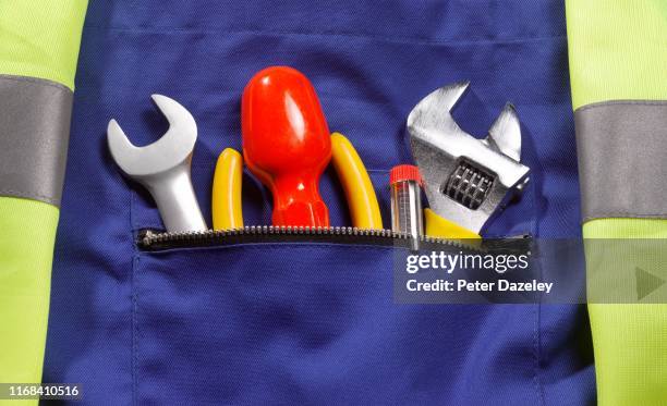 close up of roadside rescue mechanic's pocket - occupational health and safety stock pictures, royalty-free photos & images