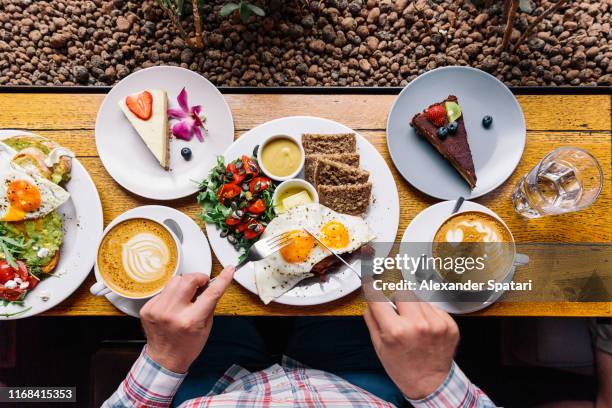 Eating Delicious Eating Delicious Cake Photos and Premium High Res Pictures - Getty Images